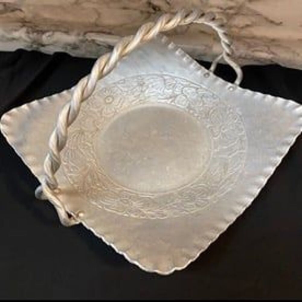 * hand-forged hammered aluminum basket engraved floral bouquet twisted handle